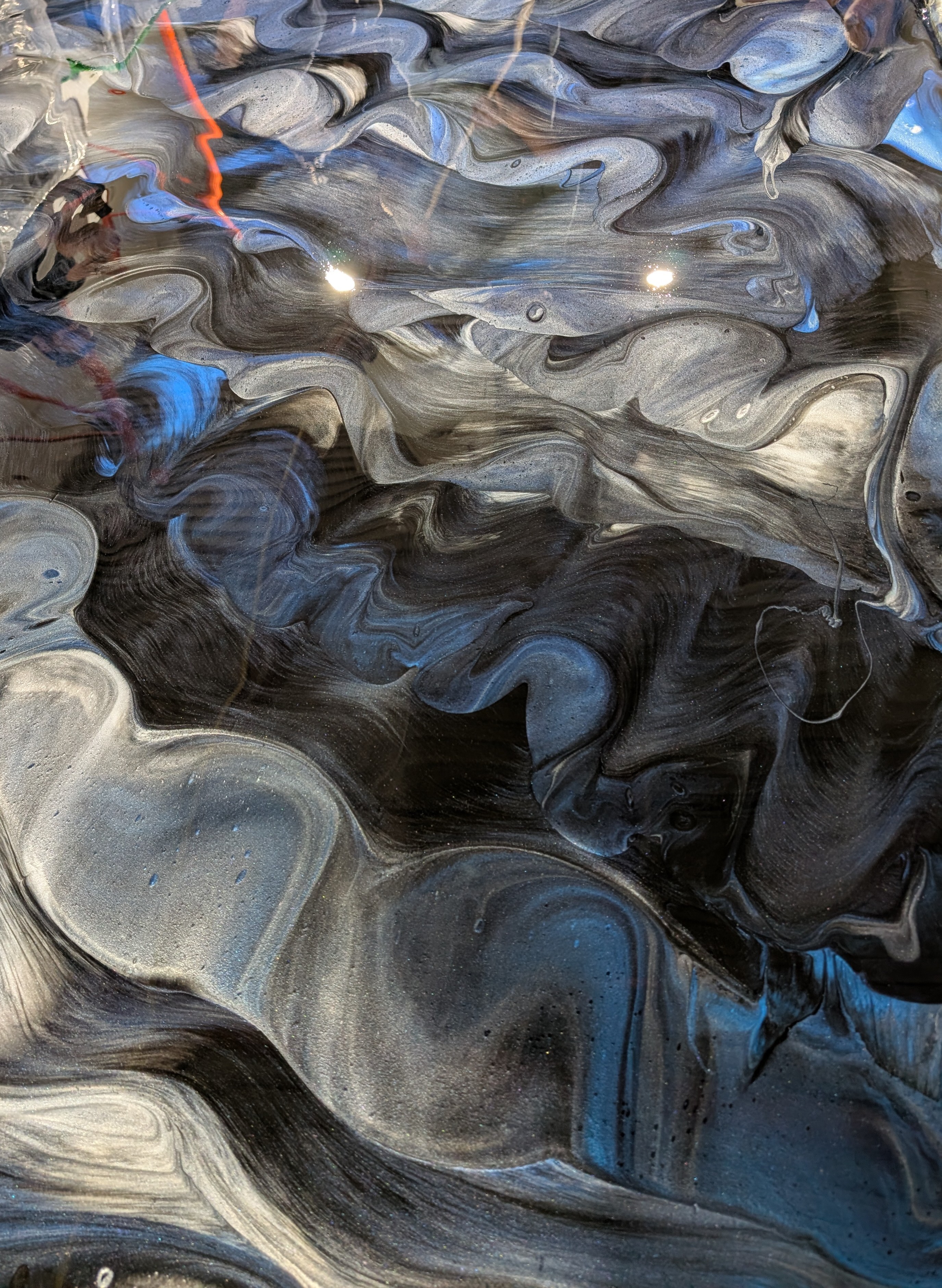 Metallic epoxy gold vein dark swirl